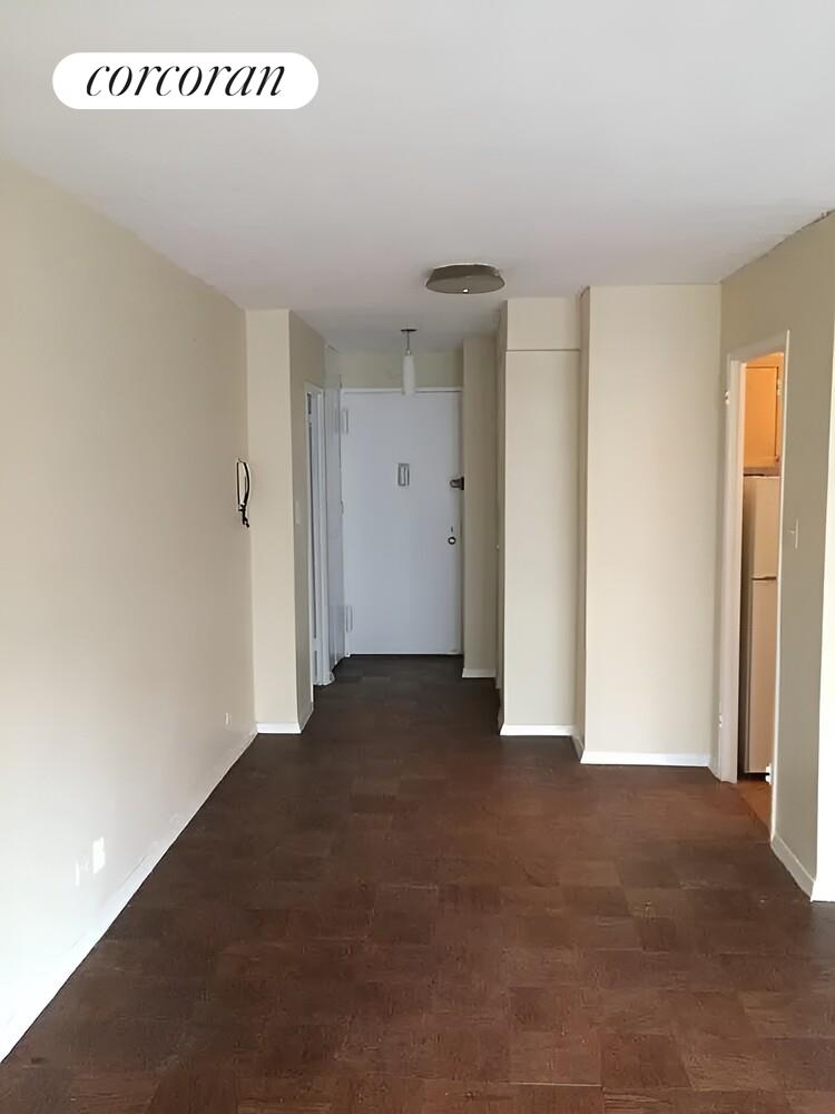 220 East 60th Street, Unit 4F Manhattan, NY 10022 - Photo 2 of 7 a view of a room with an empty space