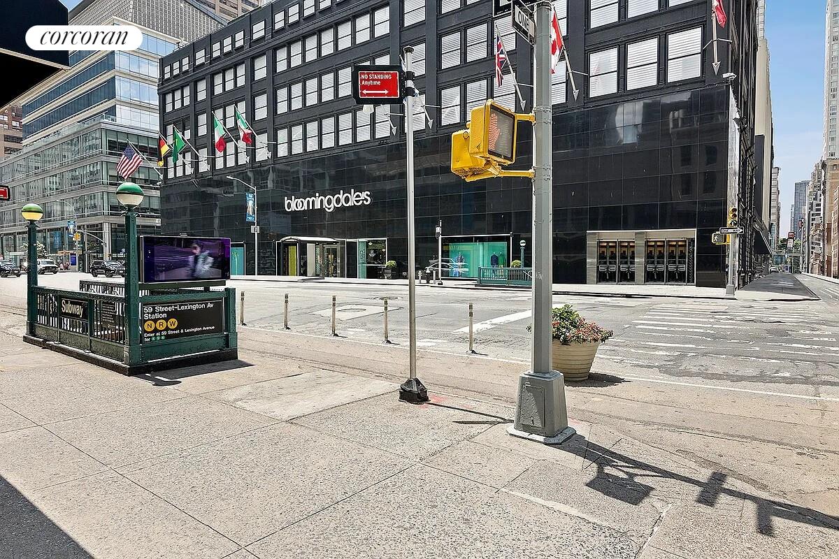 220 East 60th Street, Unit 4F Manhattan, NY 10022 - Photo 7 of 7 a view of street with shops