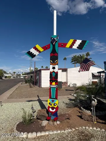 a swimming pool view with a sitting space