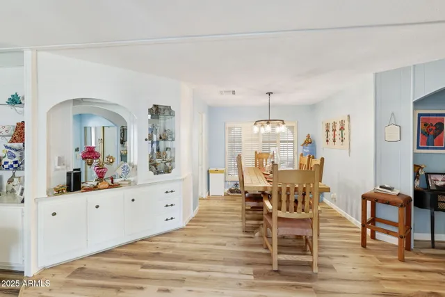 a view of a living room and dining room