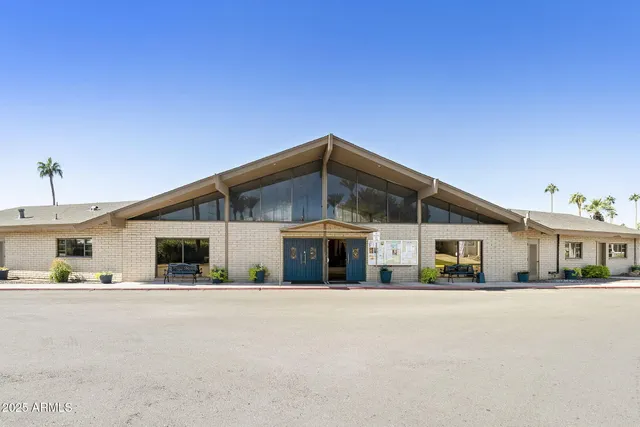 a front view of house along with street