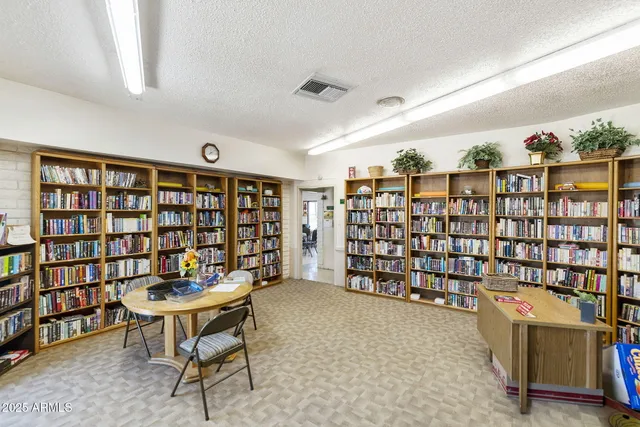 a view of a livingroom with shelves