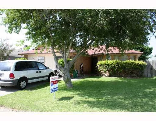 a view of yard with car parked