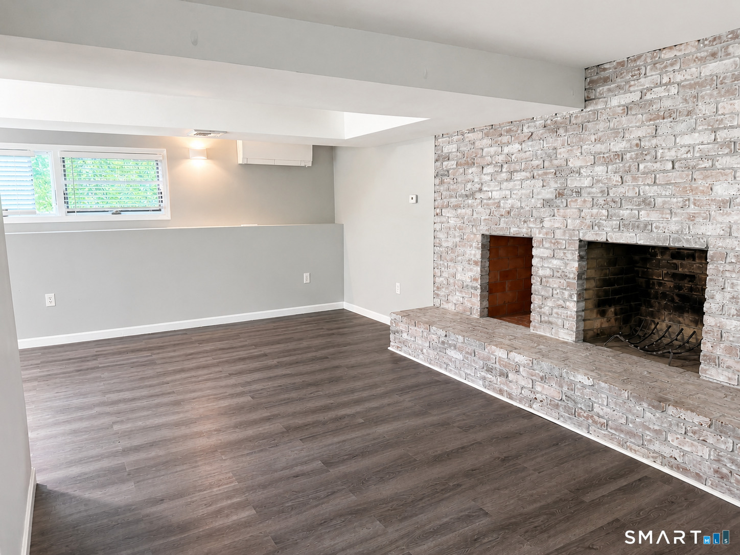 98 Fairy Dell Road Clinton, CT 06413 - Photo 16 of 25 With its own entrance, living area, fireplace, kitchenette, and full bath, this versatile studio-style in-law suite offers comfort, privacy, and endless possibilities.