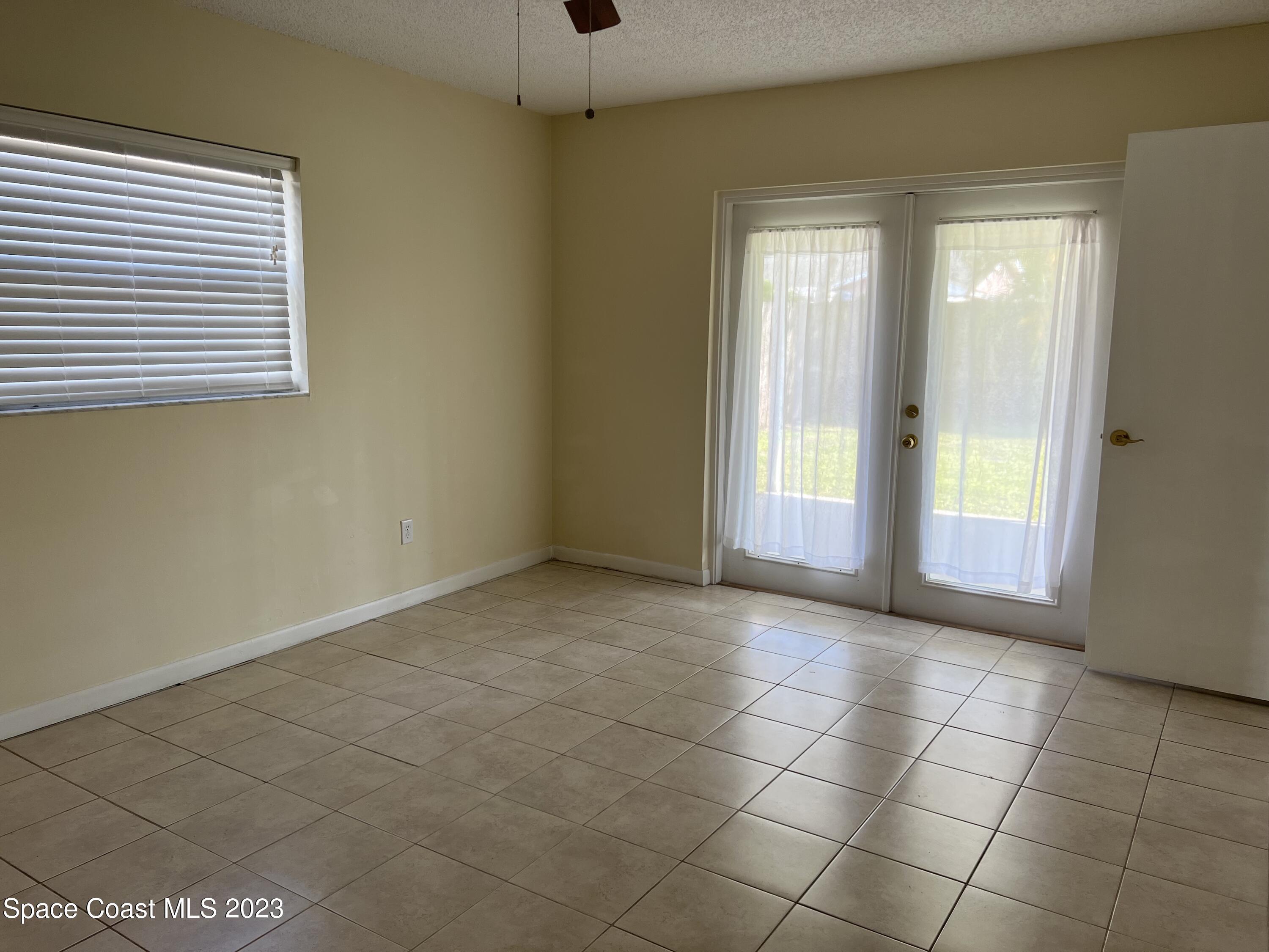 1911 Talloak Road Melbourne, FL 32935 - Photo 7 of 15 PRIMARY BEDROOM