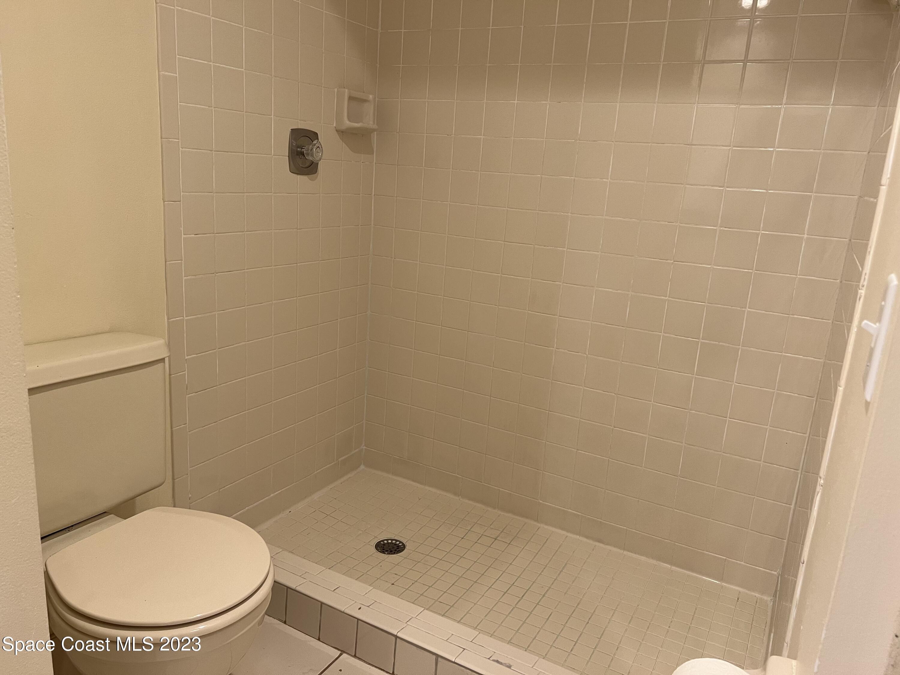 1911 Talloak Road Melbourne, FL 32935 - Photo 9 of 15 PRIMARY SHOWER