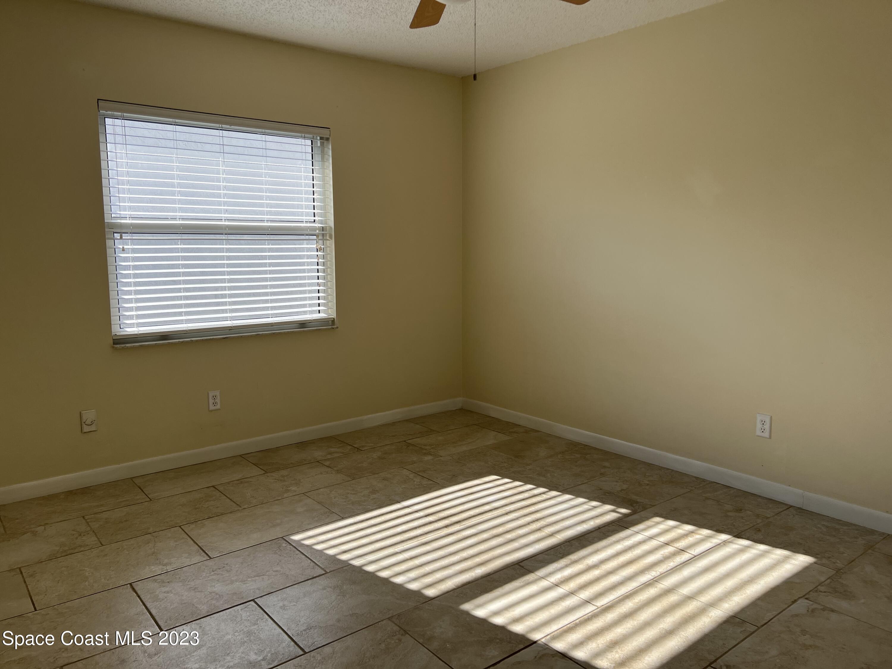 1911 Talloak Road Melbourne, FL 32935 - Photo 10 of 15 GUEST BEDROOM 3