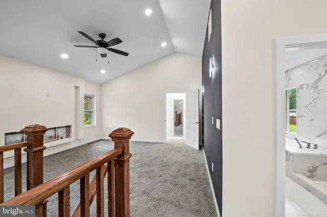 a view of a hallway with a dining space