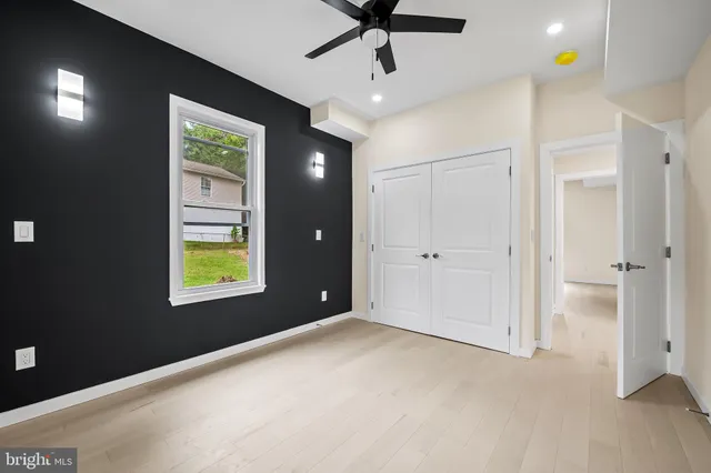 a view of staircase with wooden floor and stairs