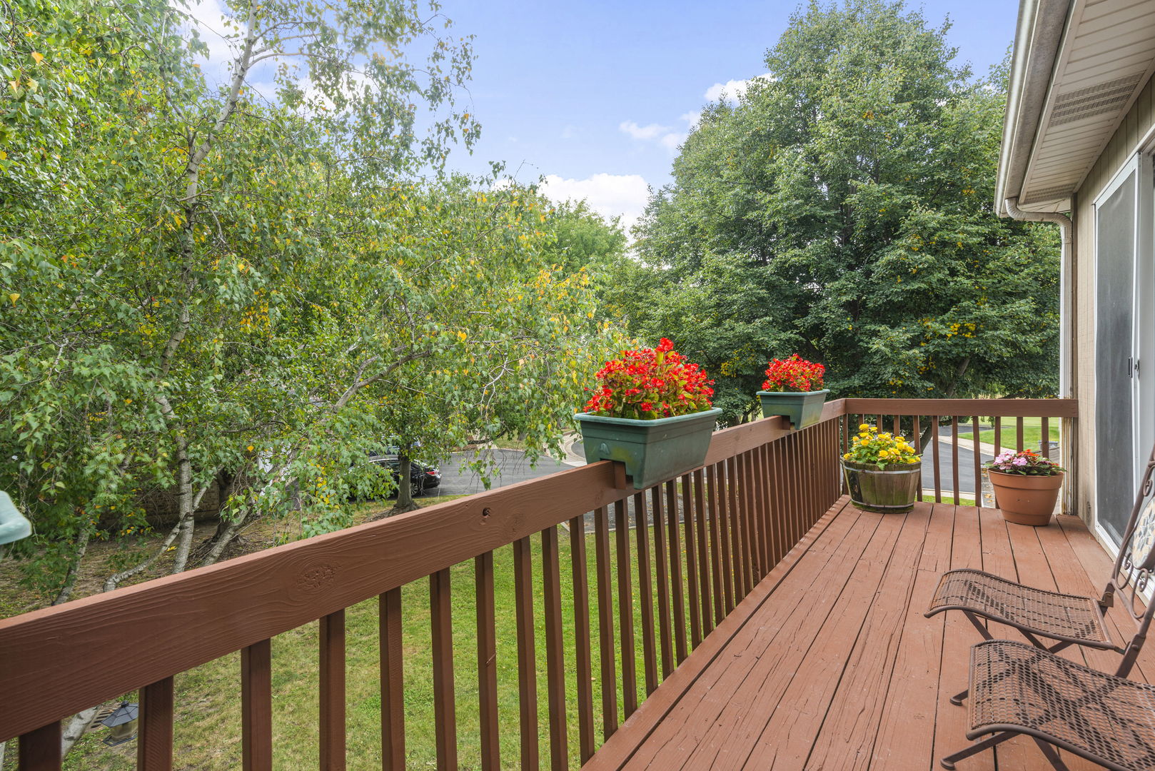1940 Matthew Court, Unit D Elgin, IL 60123 - Photo 13 of 15 a view of a balcony with wooden floor