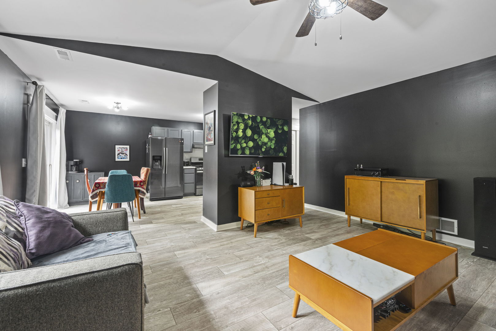1940 Matthew Court, Unit D Elgin, IL 60123 - Photo 2 of 15 a living room with furniture pool table and flat screen tv