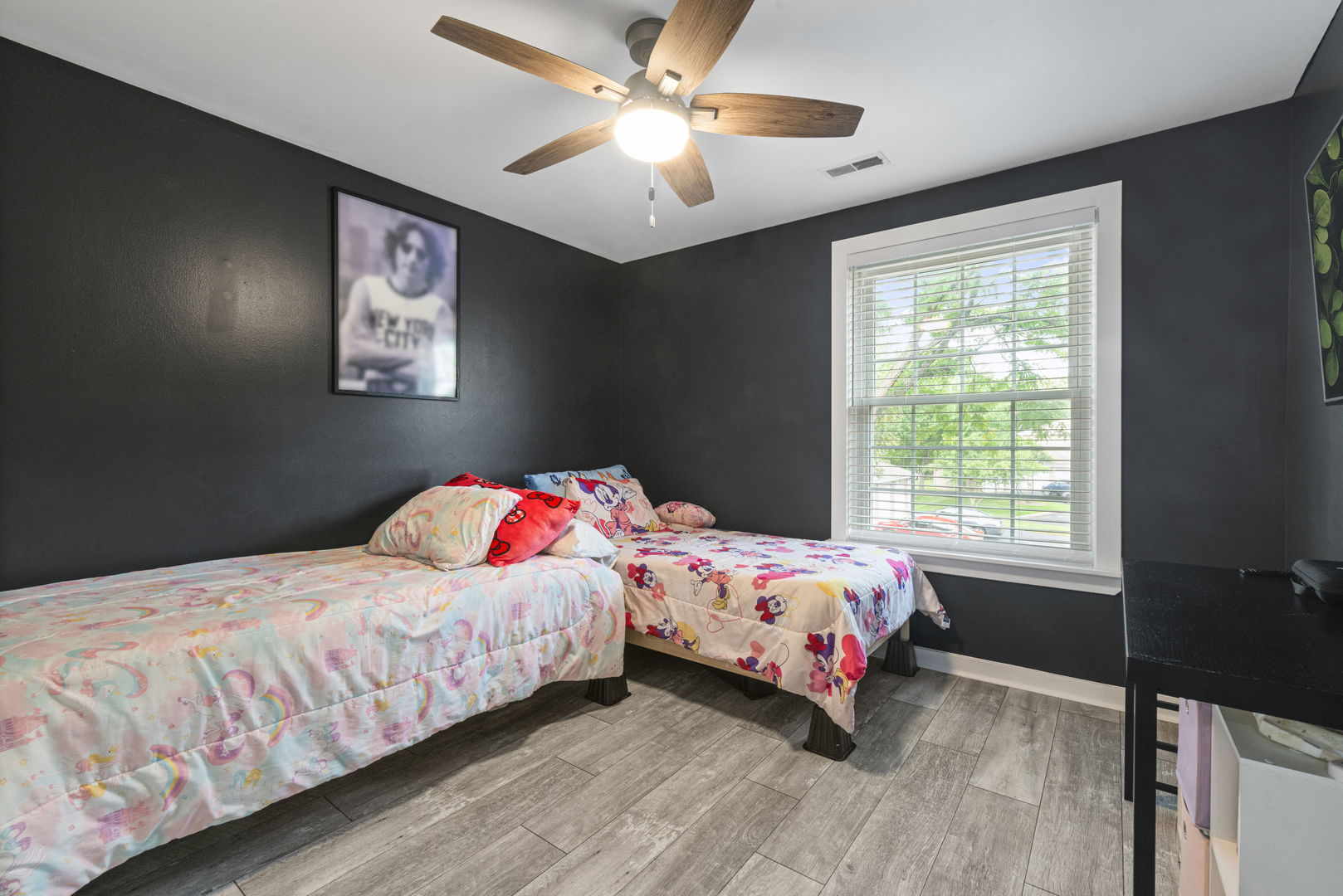 1940 Matthew Court, Unit D Elgin, IL 60123 - Photo 10 of 15 a bedroom with a bed and a window