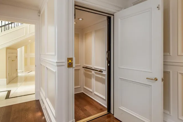 a view of a bathroom from a hallway