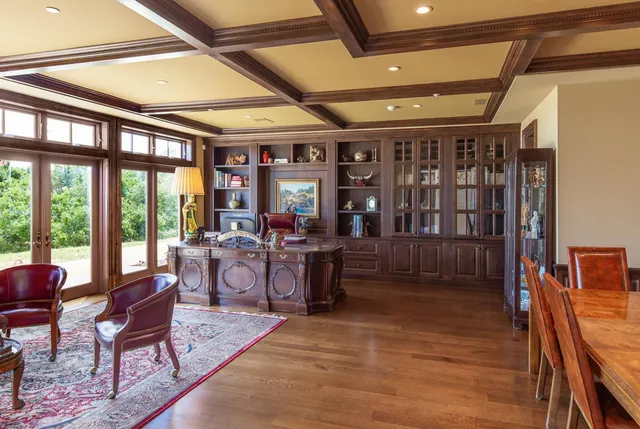 a view of a dining room with furniture window and outside view