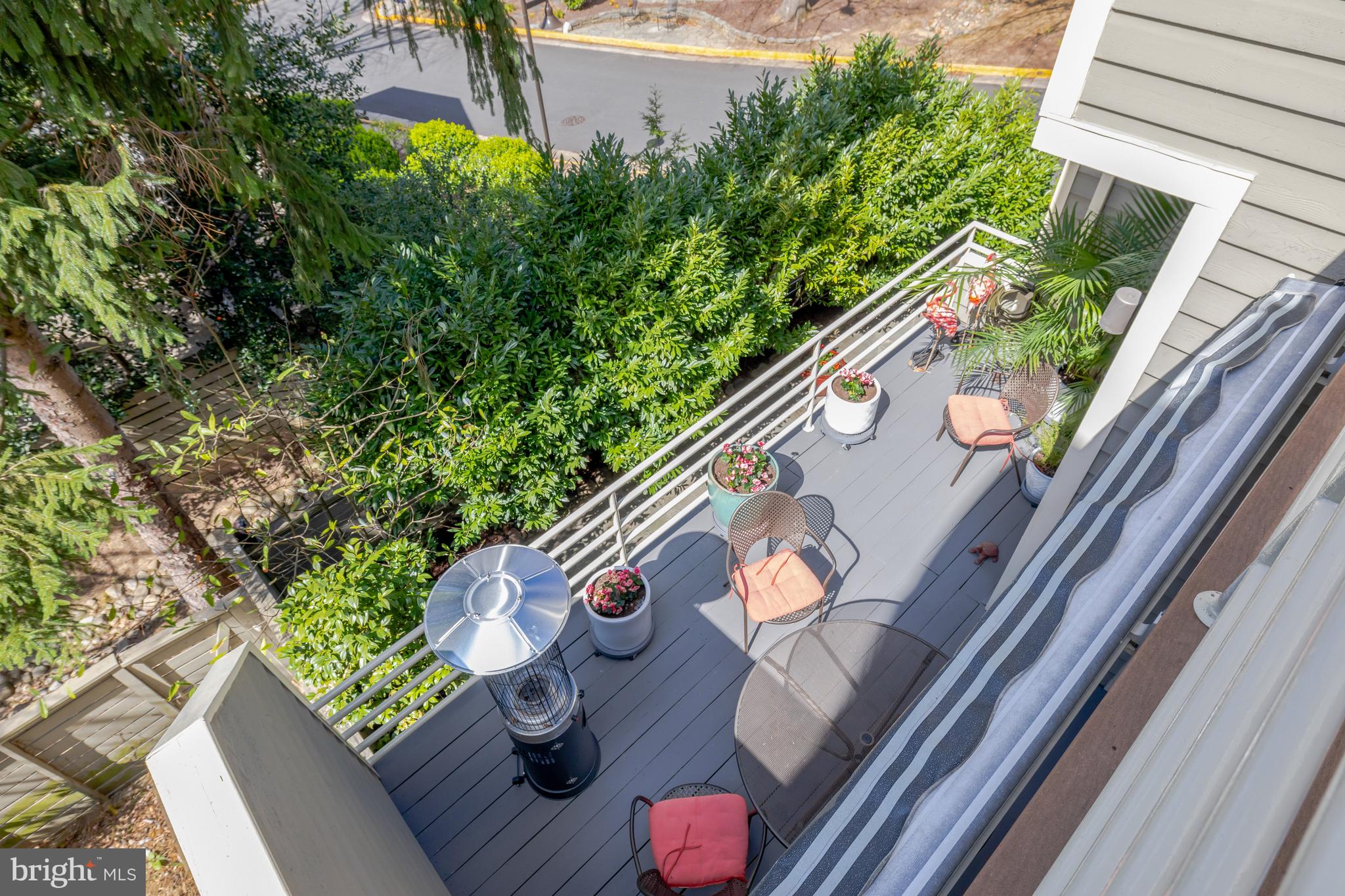 11122 Lakespray Way Reston, VA 20191 - Photo 39 of 77 A view of the main level deck from the upper deck.