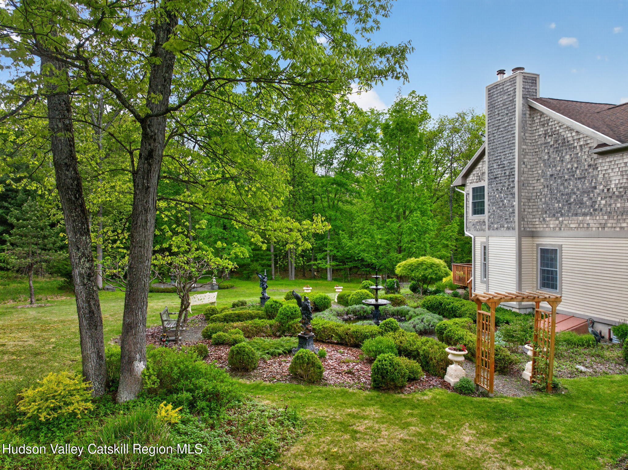 189 Bush Road Stone Ridge, NY 12484 - Photo 39 of 60 a garden with lots of trees