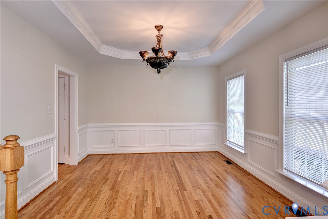 11385 Winding River Road Providence Forge, VA 23140 - Photo 14 of 43 a view of empty room with wooden floor and fan