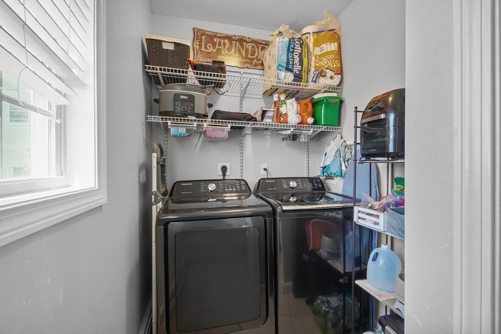 249 Baird Street Fall River, MA 02721 - Photo 19 of 23 a kitchen with stainless steel appliances granite countertop a stove and a refrigerator