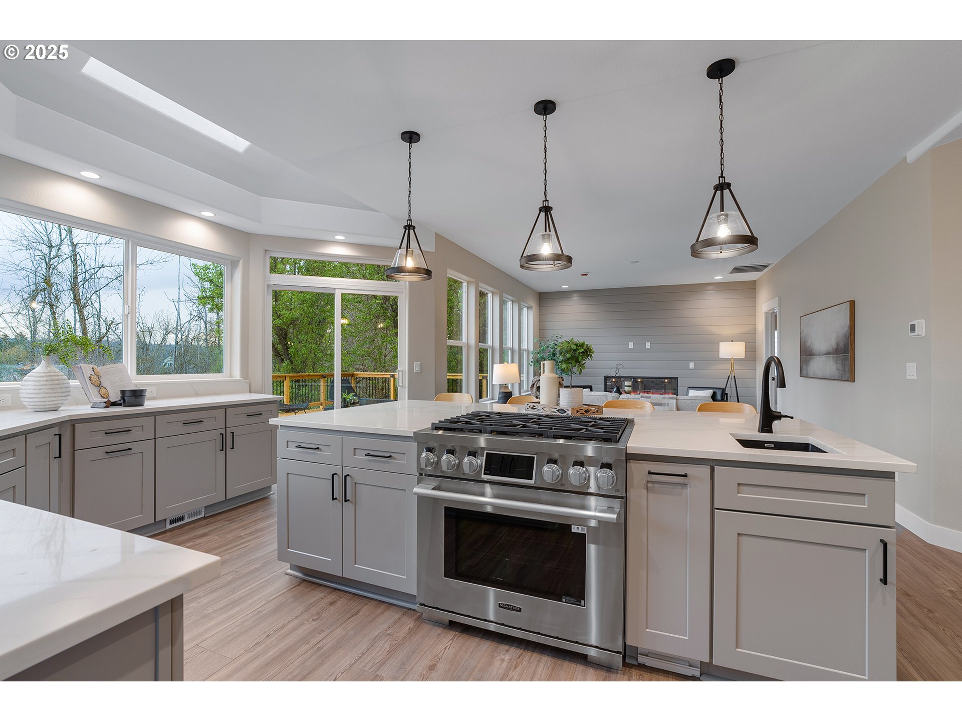 655 Barbary Place Gladstone, OR 97027 - Photo 14 of 48 a kitchen with a stove and a sink