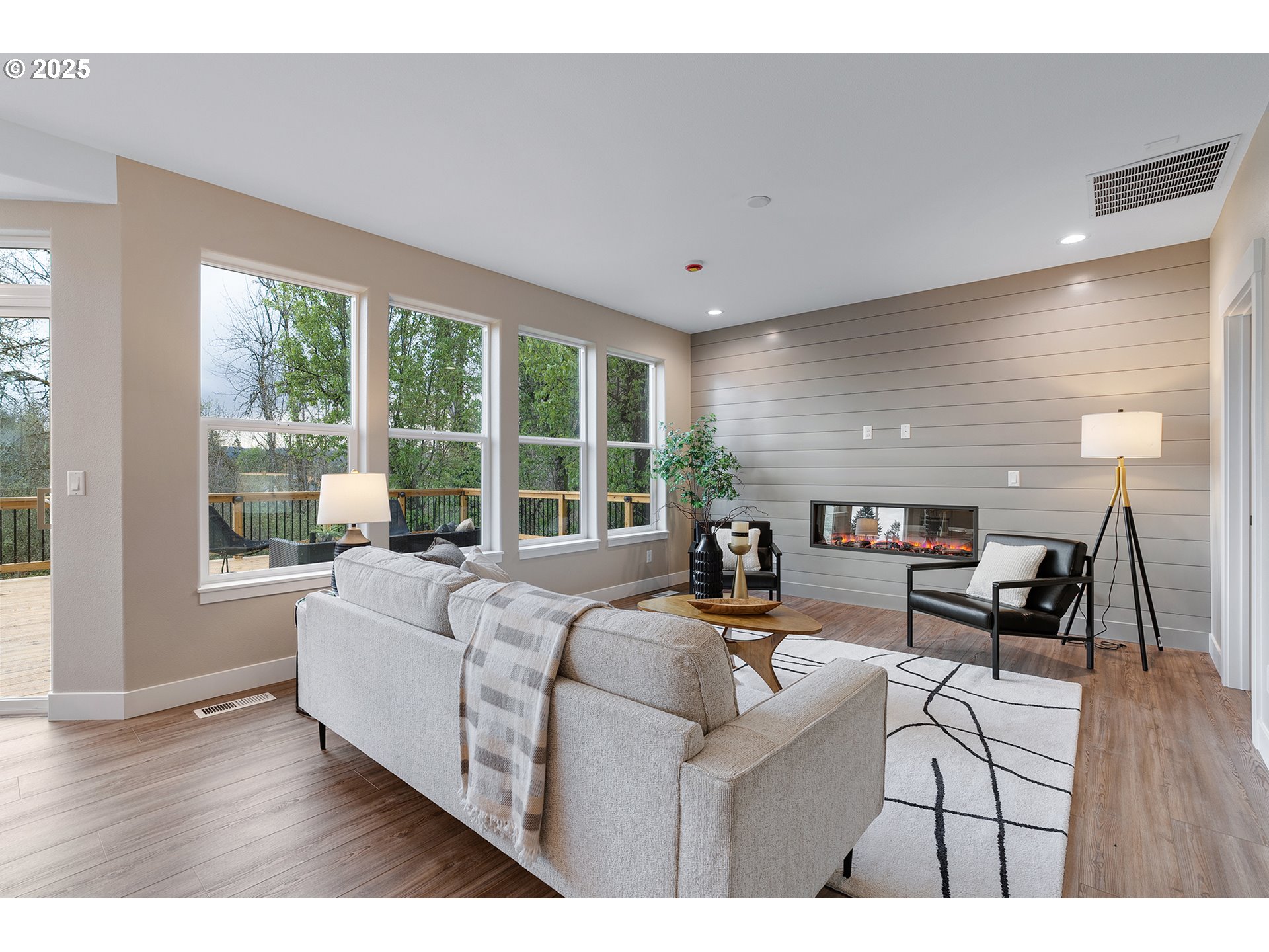 655 Barbary Place Gladstone, OR 97027 - Photo 15 of 48 a living room with furniture and a large window
