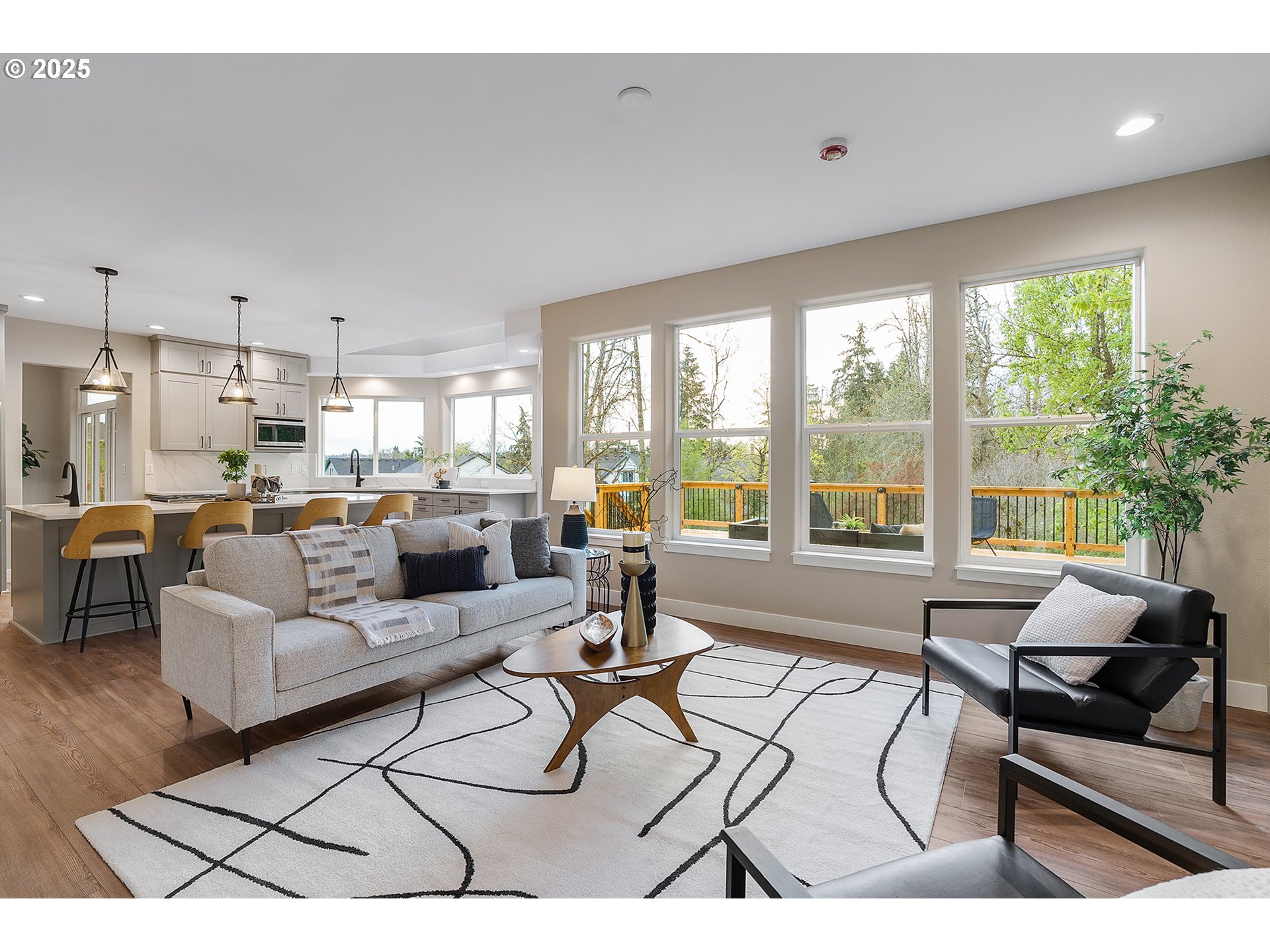 655 Barbary Place Gladstone, OR 97027 - Photo 17 of 48 a living room with furniture and a large window