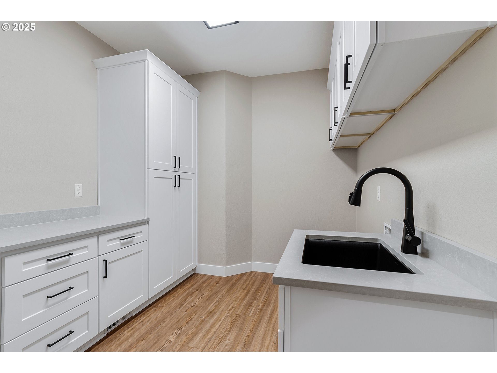 655 Barbary Place Gladstone, OR 97027 - Photo 19 of 48 a kitchen with a sink and cabinets