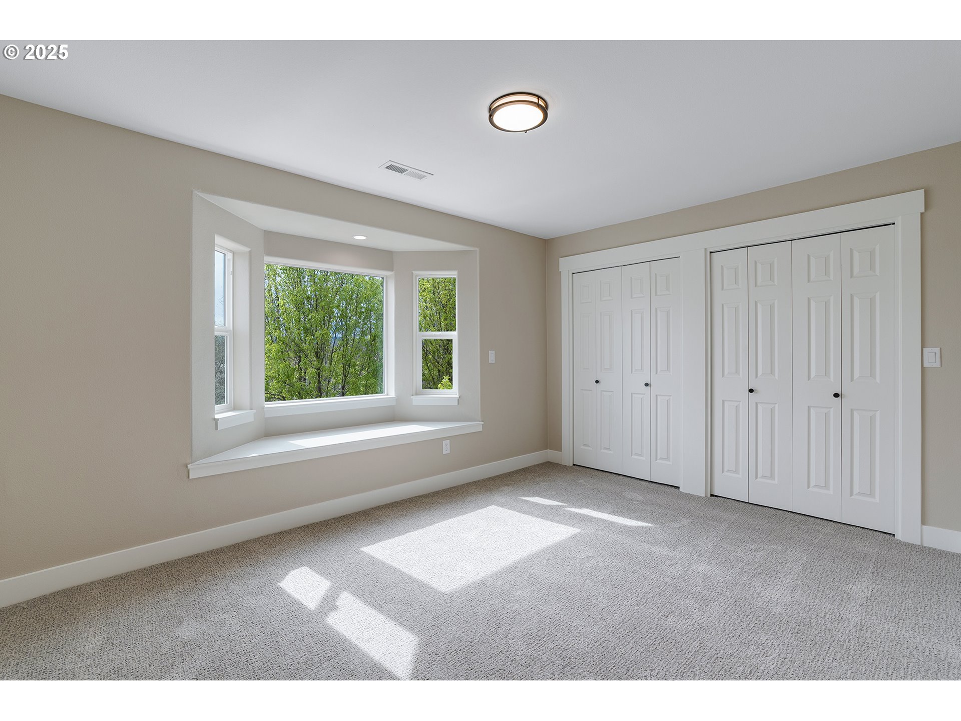 655 Barbary Place Gladstone, OR 97027 - Photo 26 of 48 a view of an empty room with a window