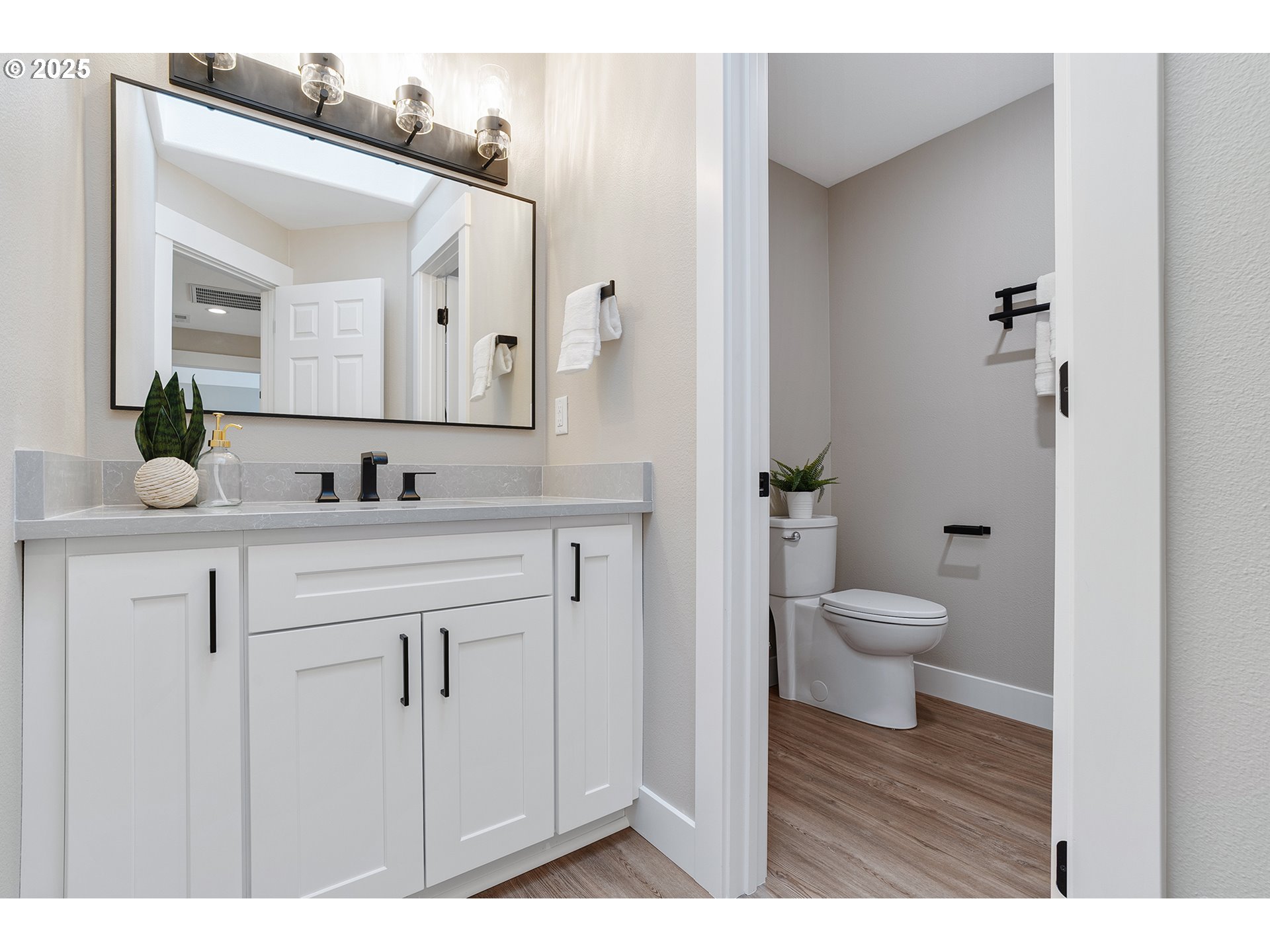 655 Barbary Place Gladstone, OR 97027 - Photo 27 of 48 a bathroom with a granite countertop sink mirror and a toilet