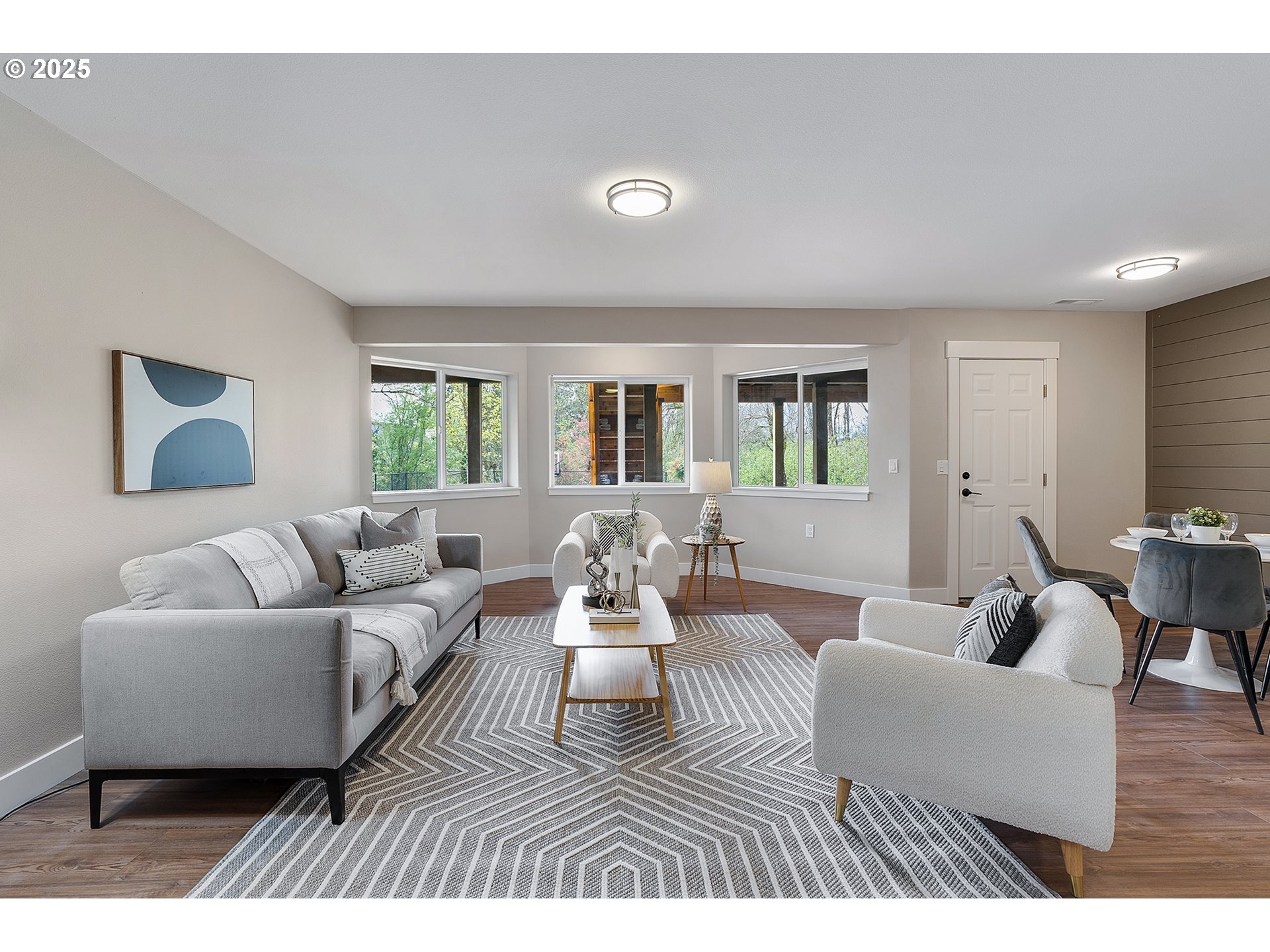 655 Barbary Place Gladstone, OR 97027 - Photo 31 of 48 a living room with furniture and a wooden floor