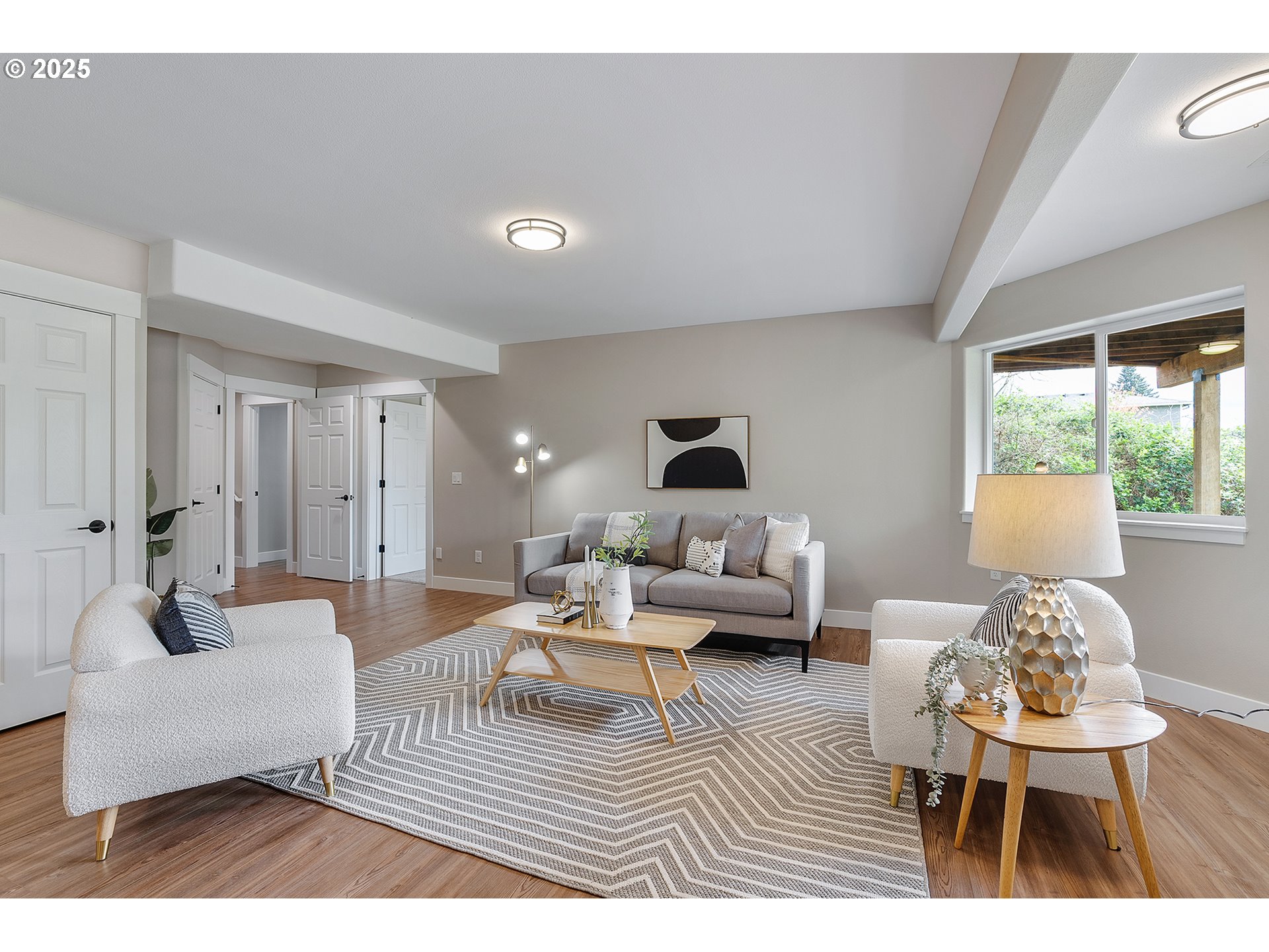 655 Barbary Place Gladstone, OR 97027 - Photo 32 of 48 a living room with furniture and a large window