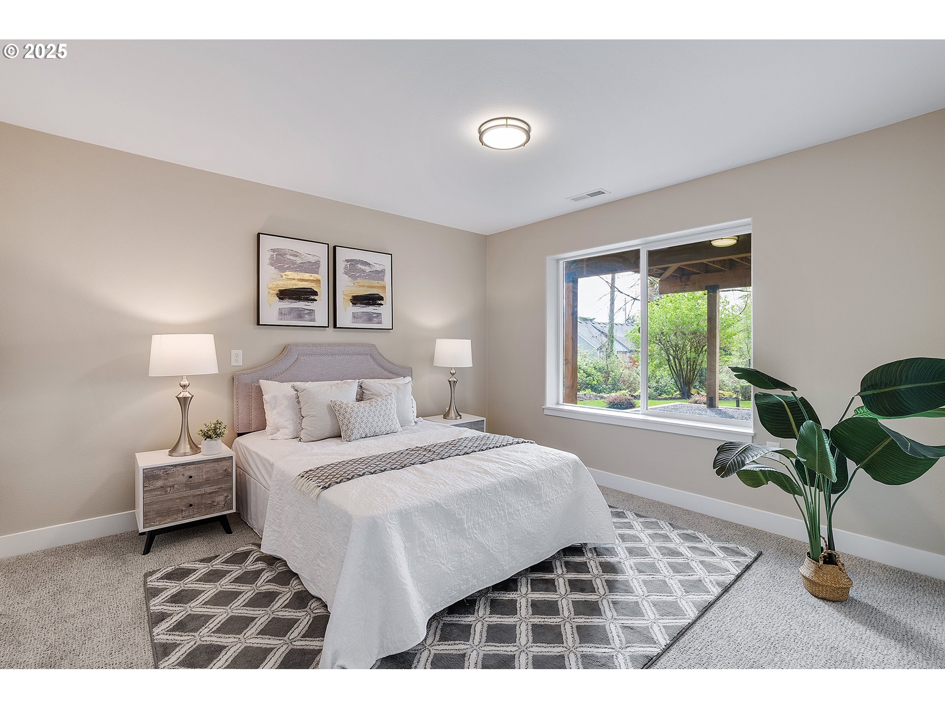 655 Barbary Place Gladstone, OR 97027 - Photo 34 of 48 a living room with a bed furniture and a window
