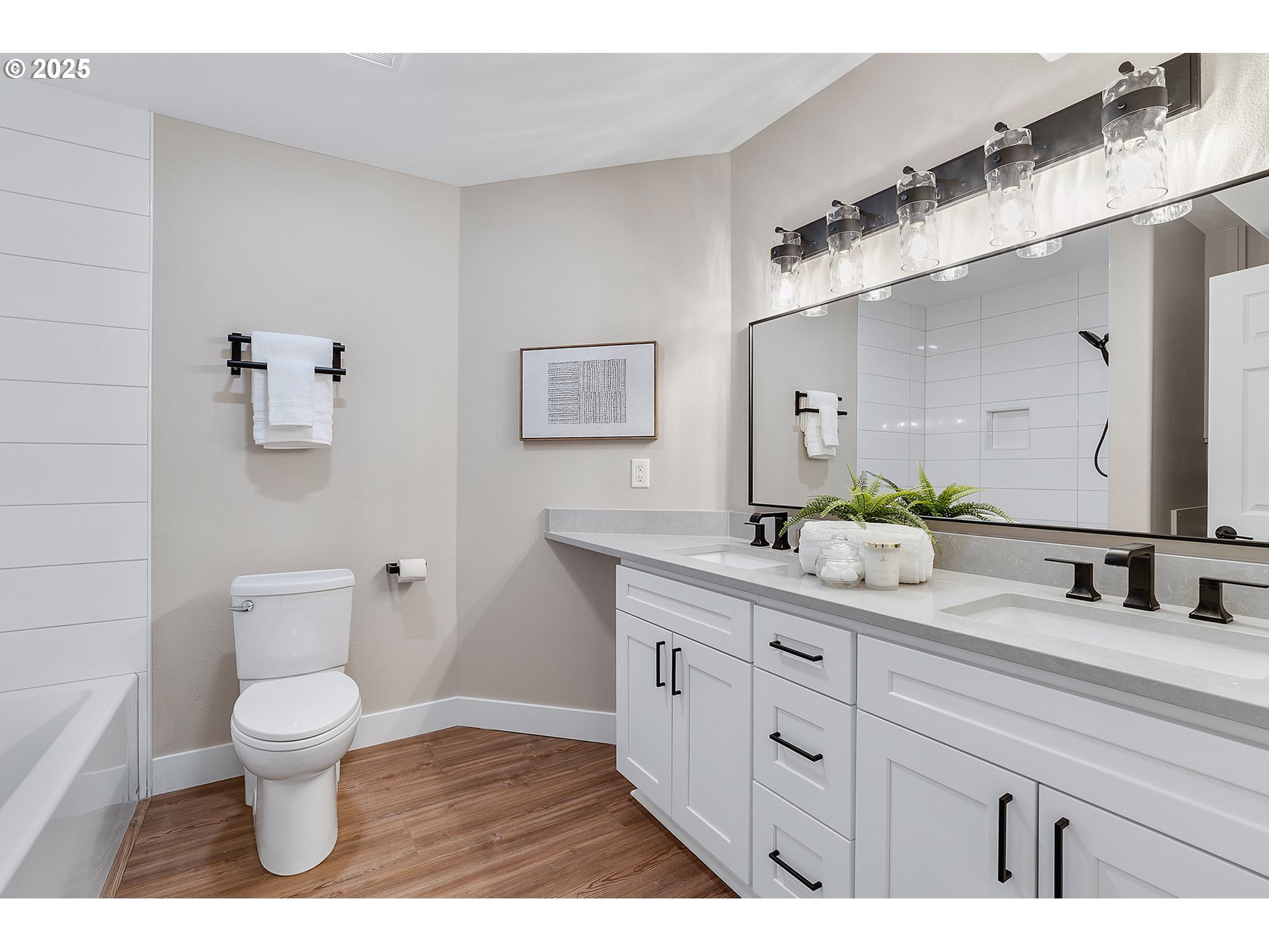 655 Barbary Place Gladstone, OR 97027 - Photo 35 of 48 a bathroom with a toilet sink and mirror