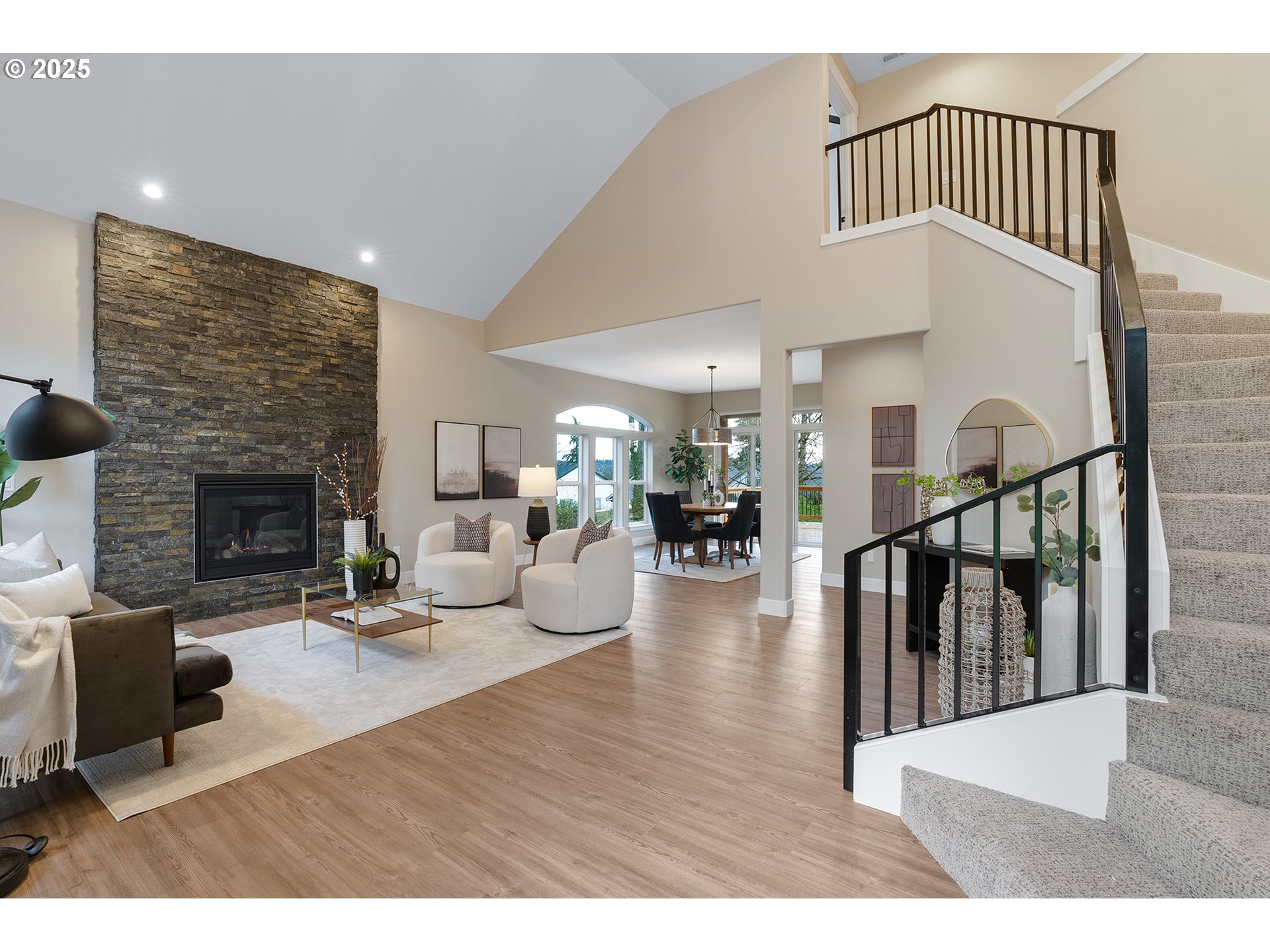 655 Barbary Place Gladstone, OR 97027 - Photo 4 of 48 a view of livingroom with dining room and fireplace