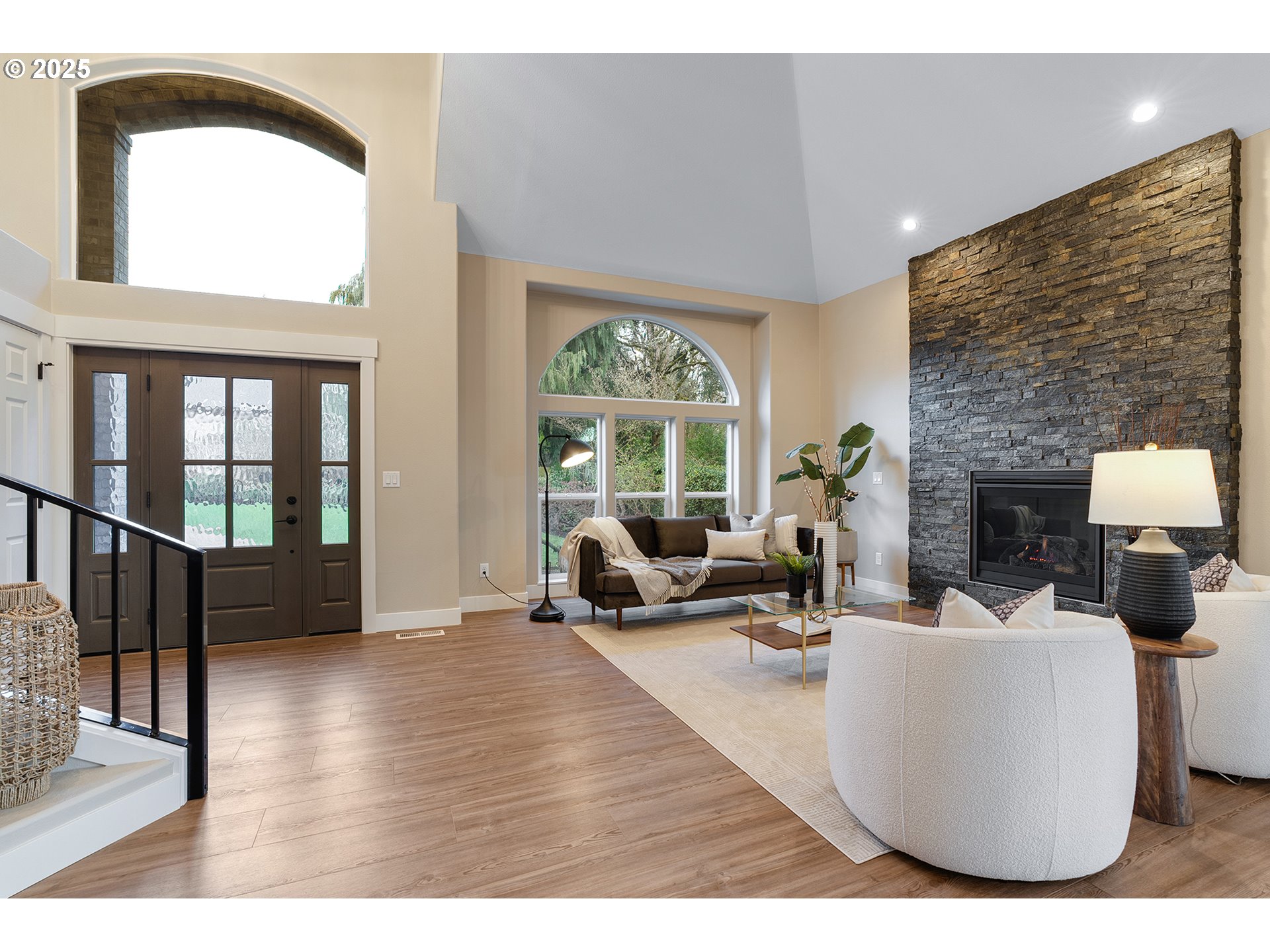 655 Barbary Place Gladstone, OR 97027 - Photo 5 of 48 a living room with furniture large window and fireplace