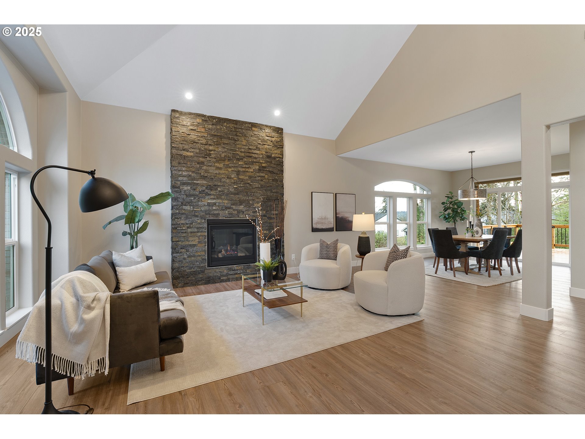 655 Barbary Place Gladstone, OR 97027 - Photo 6 of 48 a living room with furniture and a fireplace