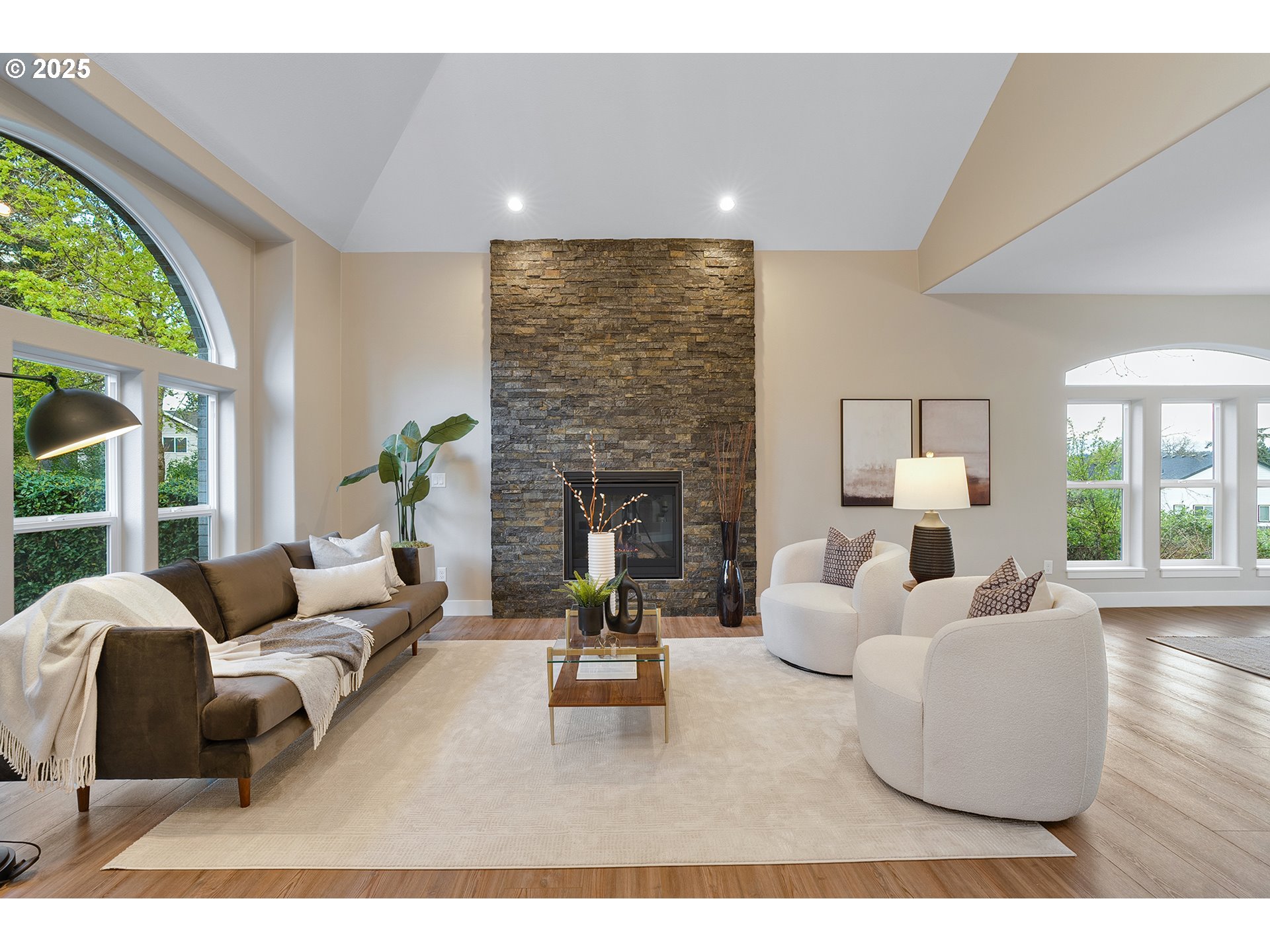 655 Barbary Place Gladstone, OR 97027 - Photo 7 of 48 a living room with furniture fireplace and large windows