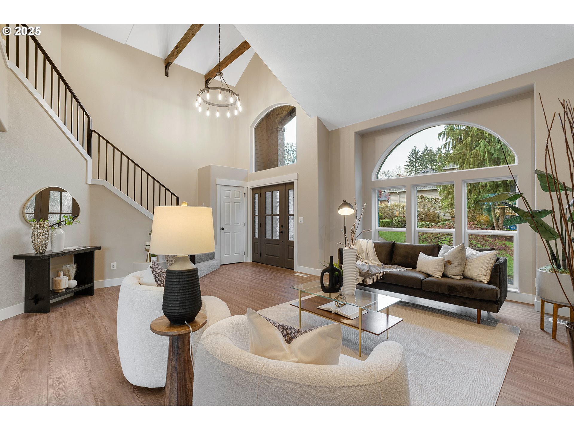 655 Barbary Place Gladstone, OR 97027 - Photo 8 of 48 a living room with furniture a fireplace and a large window