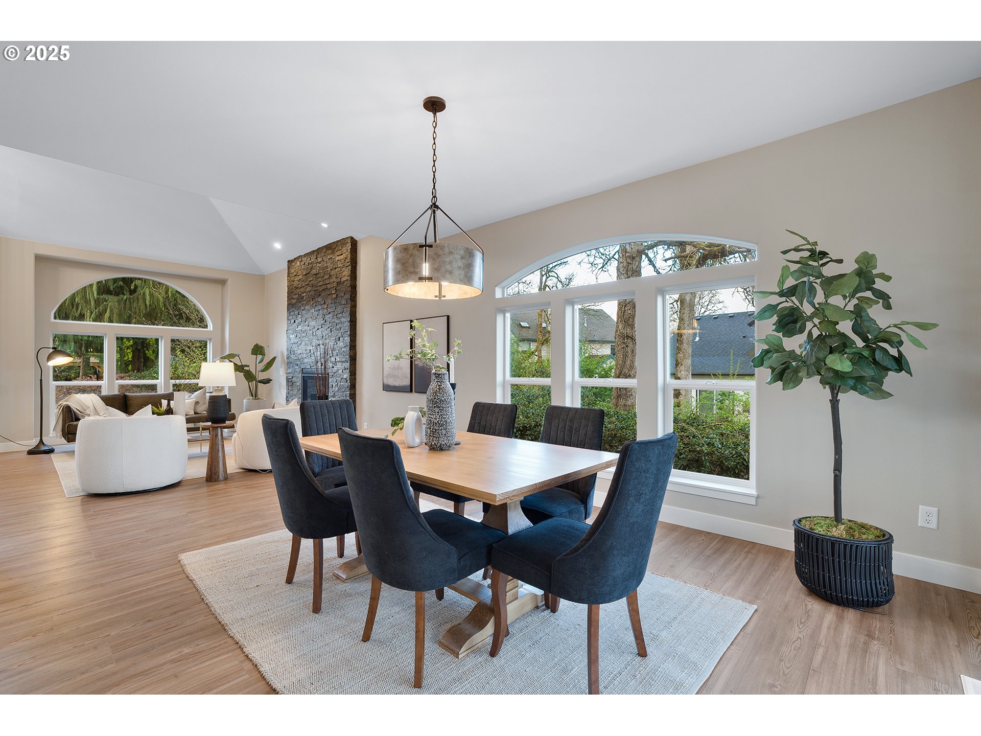 655 Barbary Place Gladstone, OR 97027 - Photo 10 of 48 a view of a dining room with furniture window and wooden floor