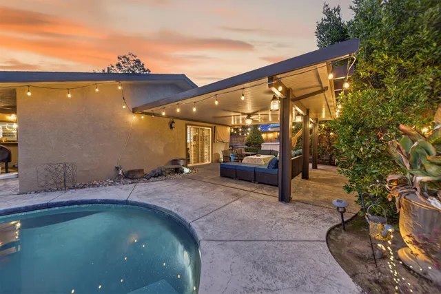 an aerial view of a house with a garden
