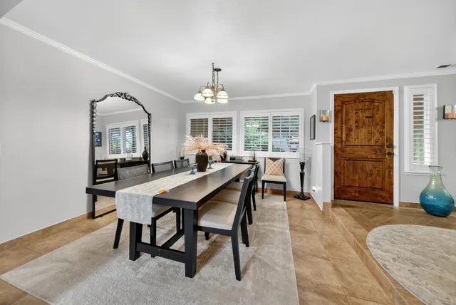 a view of a dining room with furniture