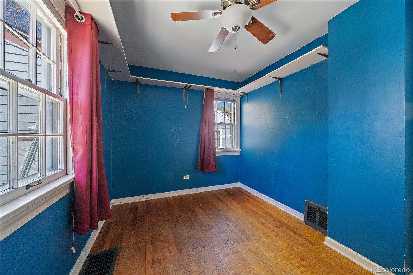 2575 South Lafayette Street Denver, CO 80210 - Photo 12 of 25 a view of empty room with windows