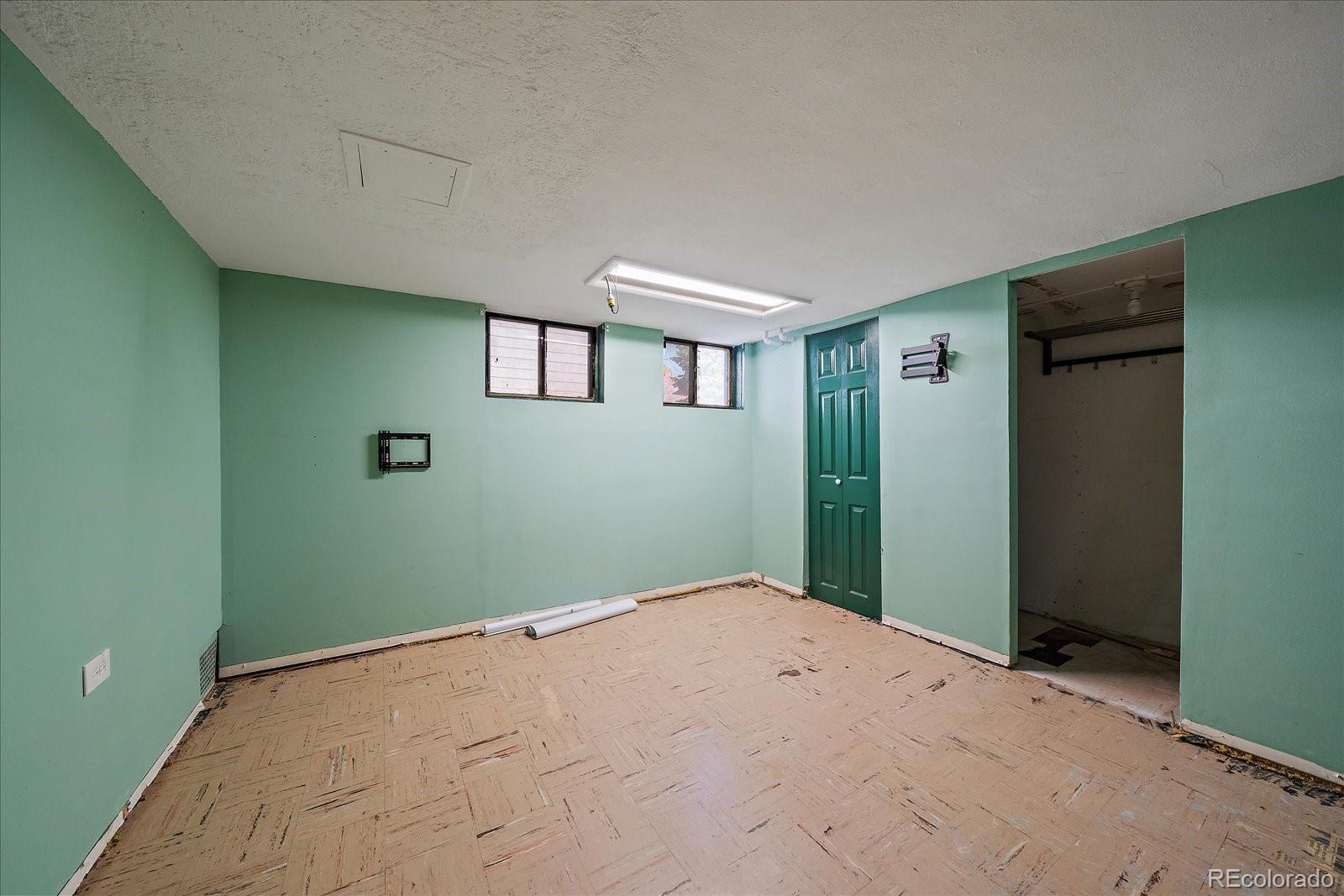 2575 South Lafayette Street Denver, CO 80210 - Photo 16 of 25 an empty room with windows