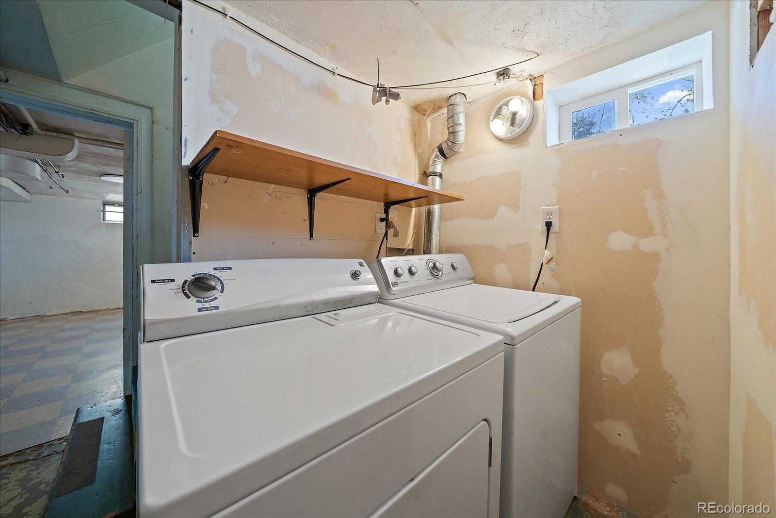2575 South Lafayette Street Denver, CO 80210 - Photo 20 of 25 a utility room with dryer and washer