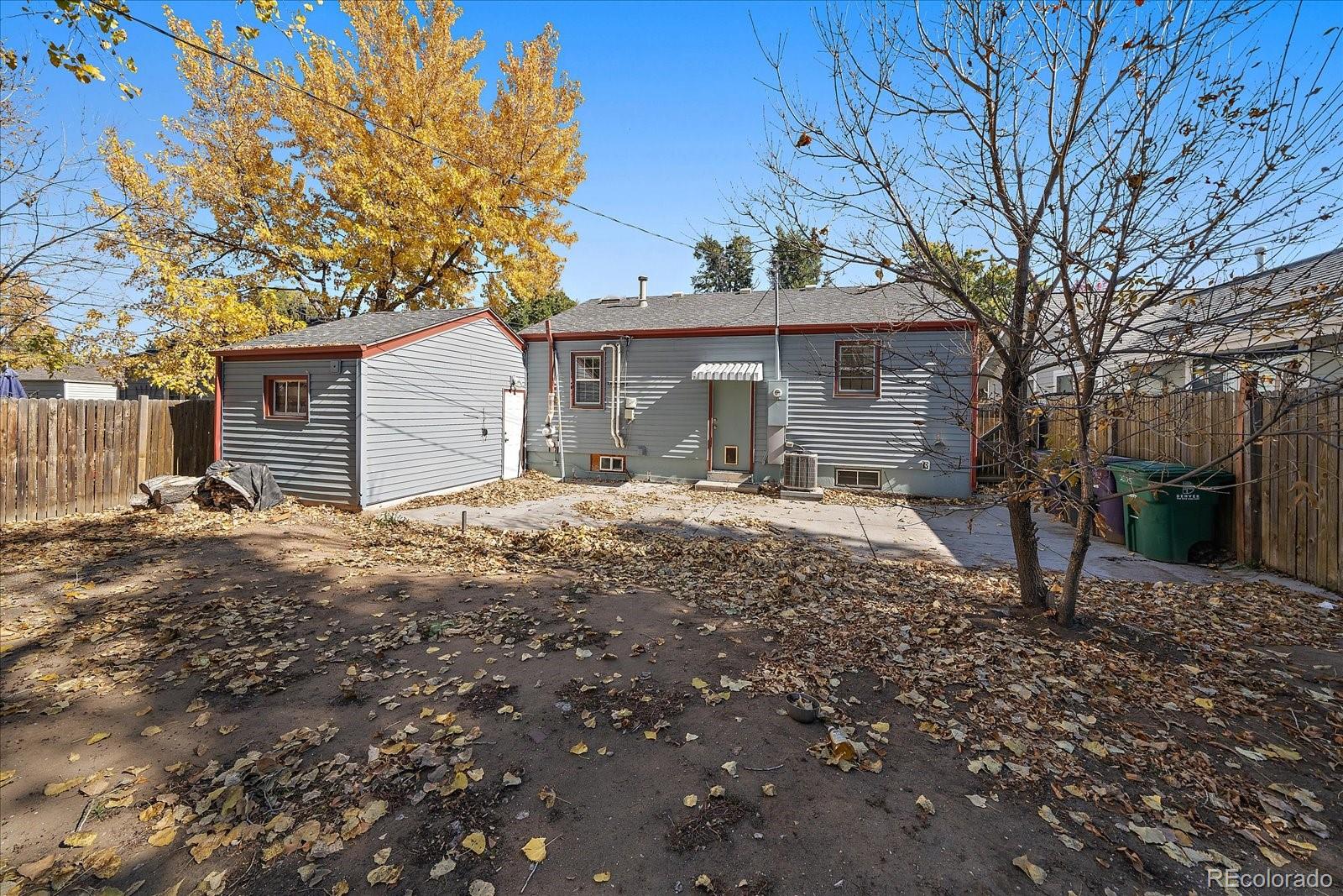 2575 South Lafayette Street Denver, CO 80210 - Photo 21 of 25 a view of a house with a yard