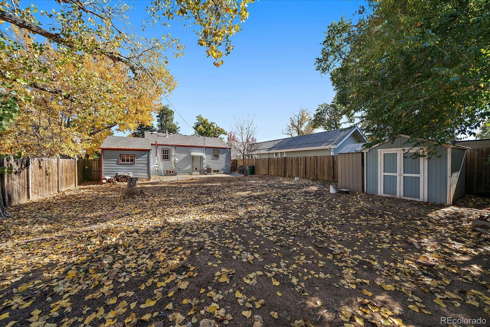 2575 South Lafayette Street Denver, CO 80210 - Photo 25 of 25 a front view of a house with a garden