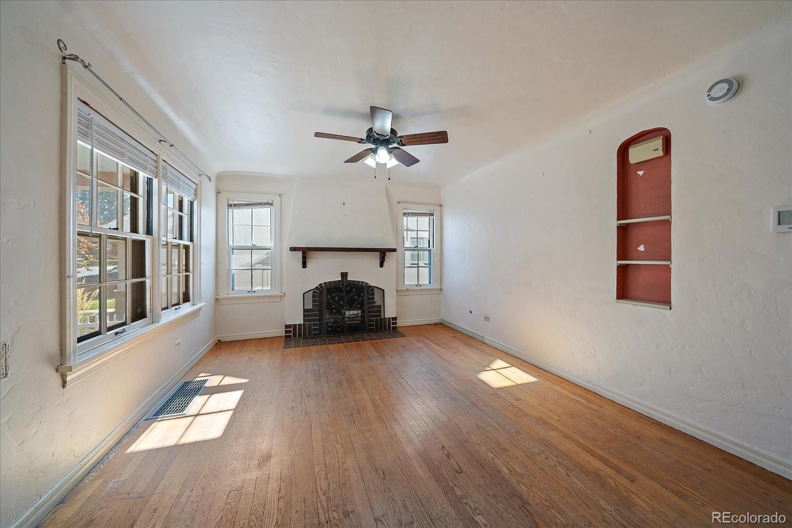 2575 South Lafayette Street Denver, CO 80210 - Photo 4 of 25 a view of livingroom with furniture and a ceiling fan