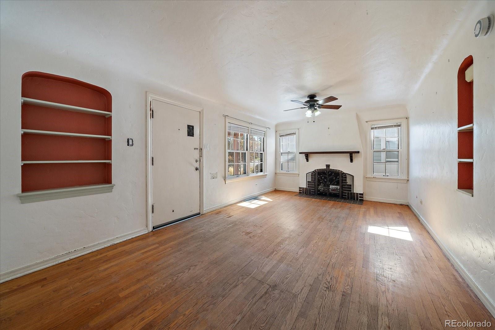 2575 South Lafayette Street Denver, CO 80210 - Photo 5 of 25 a view of living room with furniture and window