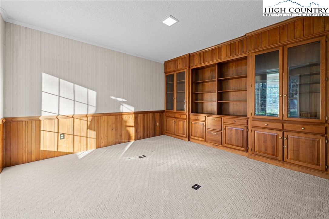 458 Jim Caudill Road Wilkesboro, NC 28697 - Photo 17 of 50 a view of an empty room with a window