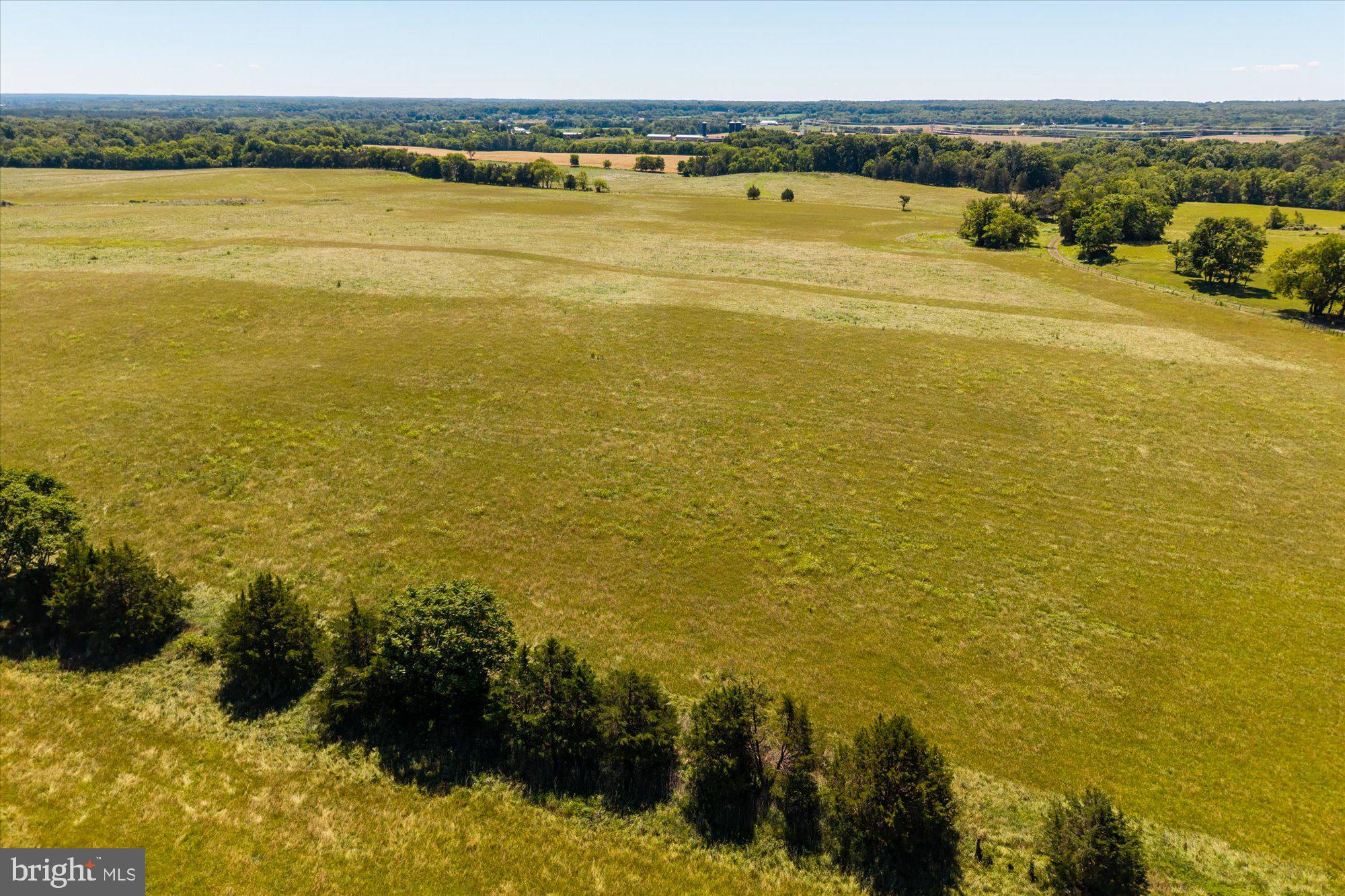 4700 Midland Road Midland, VA 22728 - Photo 11 of 31 Vast open fields under a clear sky.