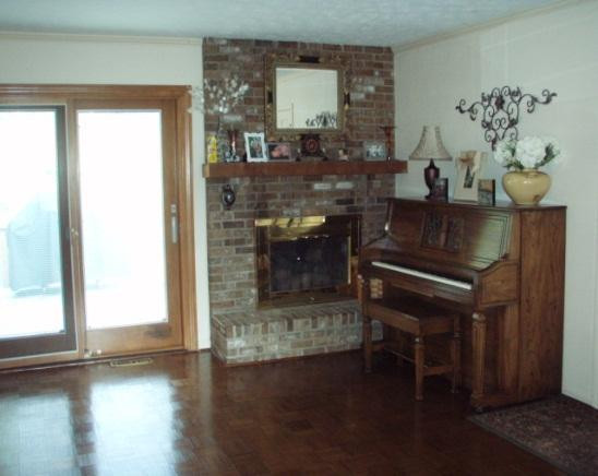 Fireplace in family room outside door le